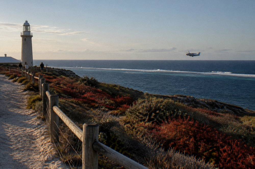 A spotter plane flying low over open ocean near Ningaloo Reef